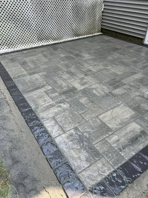 J & J Landscaping & Masonry Logo