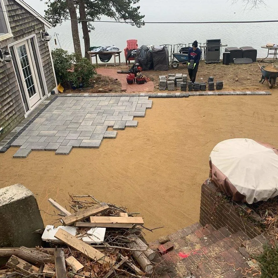 Custom yard cleanup service for year-round maintenance across Rehoboth, MA - J & J Materials Rehoboth