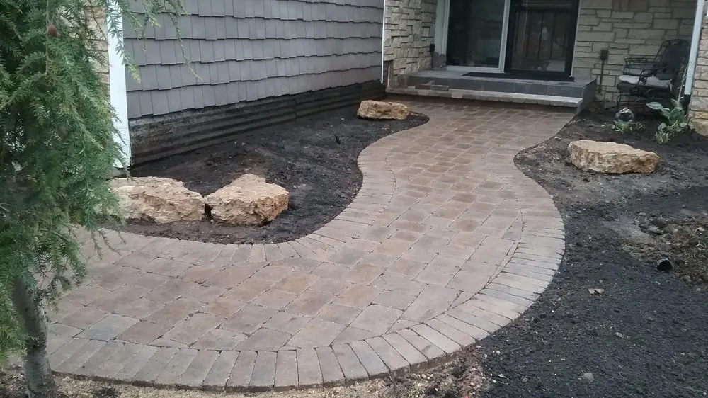 Local yard cleanup service experts serving Sharon, WI - J & L 4 Seasons