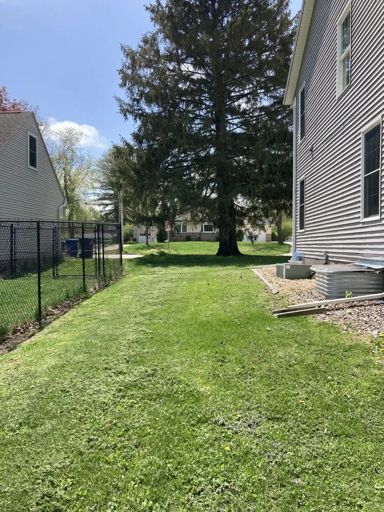 Custom landscape installation in Waterloo, IA by J & M Property Maintenance