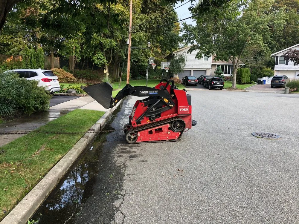 Affordable landscaping services for year-round maintenance in Westbury, NY by J & R Custom Landscaping