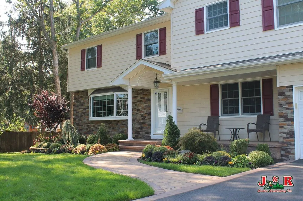 Expert landscape design for year-round maintenance in Westbury, NY by J & R Custom Landscaping