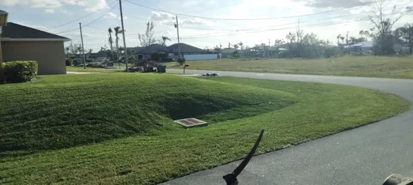 J & R Lawn Care Specialists Logo