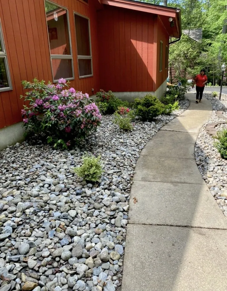 Affordable lawn care service for homes in New Brunswick, NJ by J & Son Landscape Service