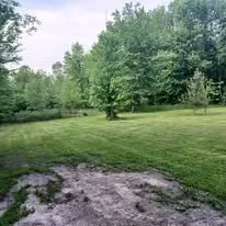 Expert landscape design for beautiful yards in Sanford, MI by J & T Yard Work