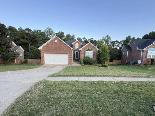 J and A Lawncare Logo