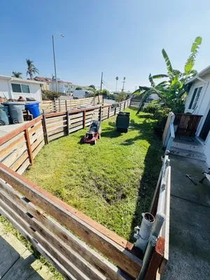 J and D lanscaping Logo