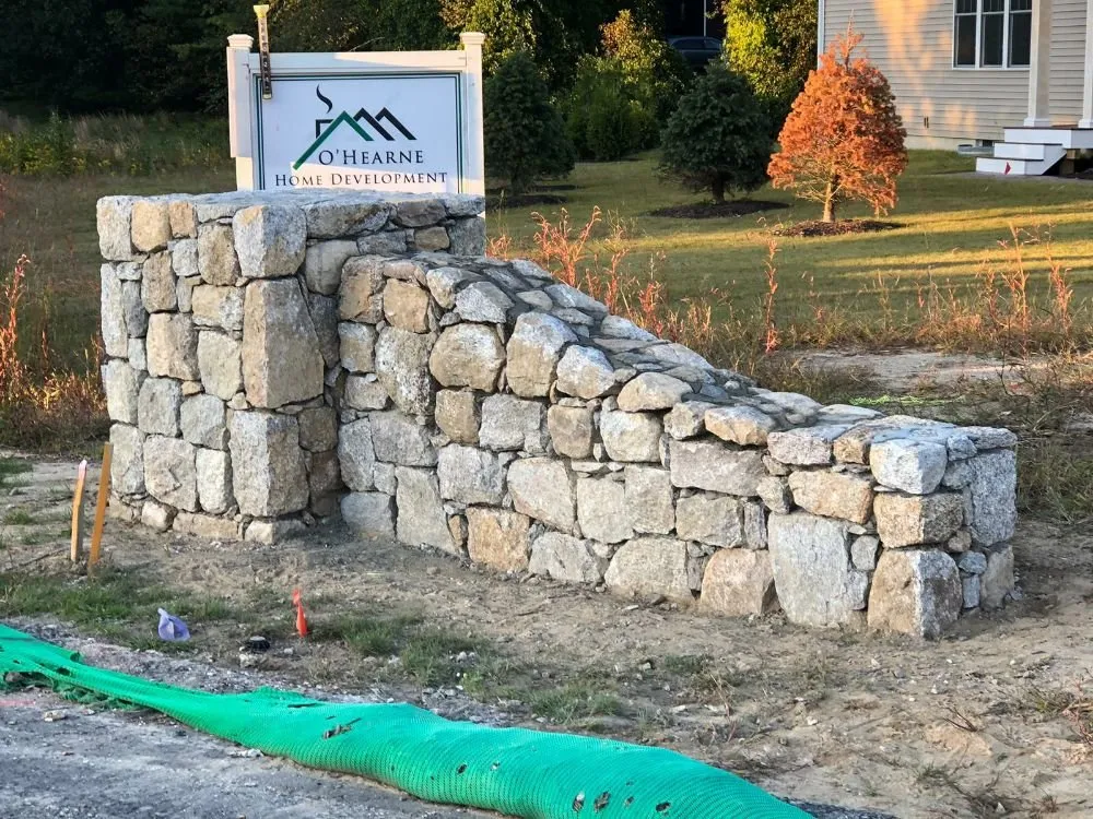 Custom lawn mowing service with custom design across Cranston, RI - J and G Masonry