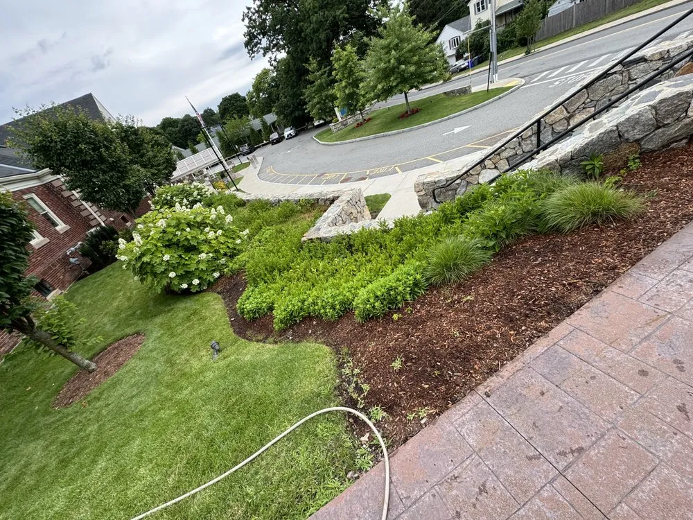 Local lawn mowing service with custom design across Boston, MA - J and J Landscaping