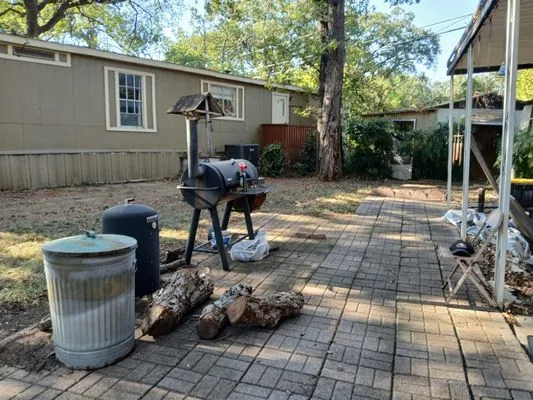 J and M Lawn Service Logo