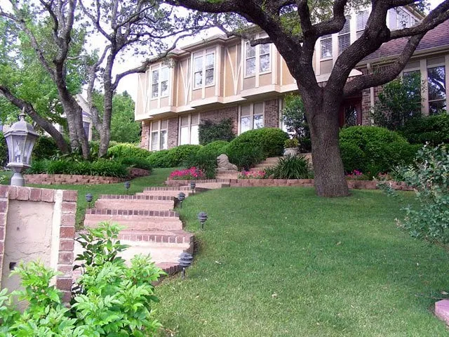 Professional garden landscaping for beautiful yards in Creedmoor, TX by J B Rogers Landscape Services