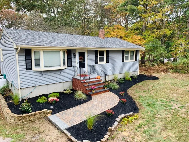 Reliable lawn care service for residential properties across Uxbridge, MA - J. Benjamin Landscape and Design