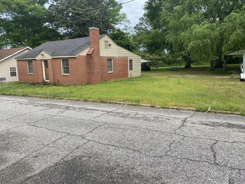 Reliable yard cleanup service with custom design across West Point, GA - J Crowe Properties