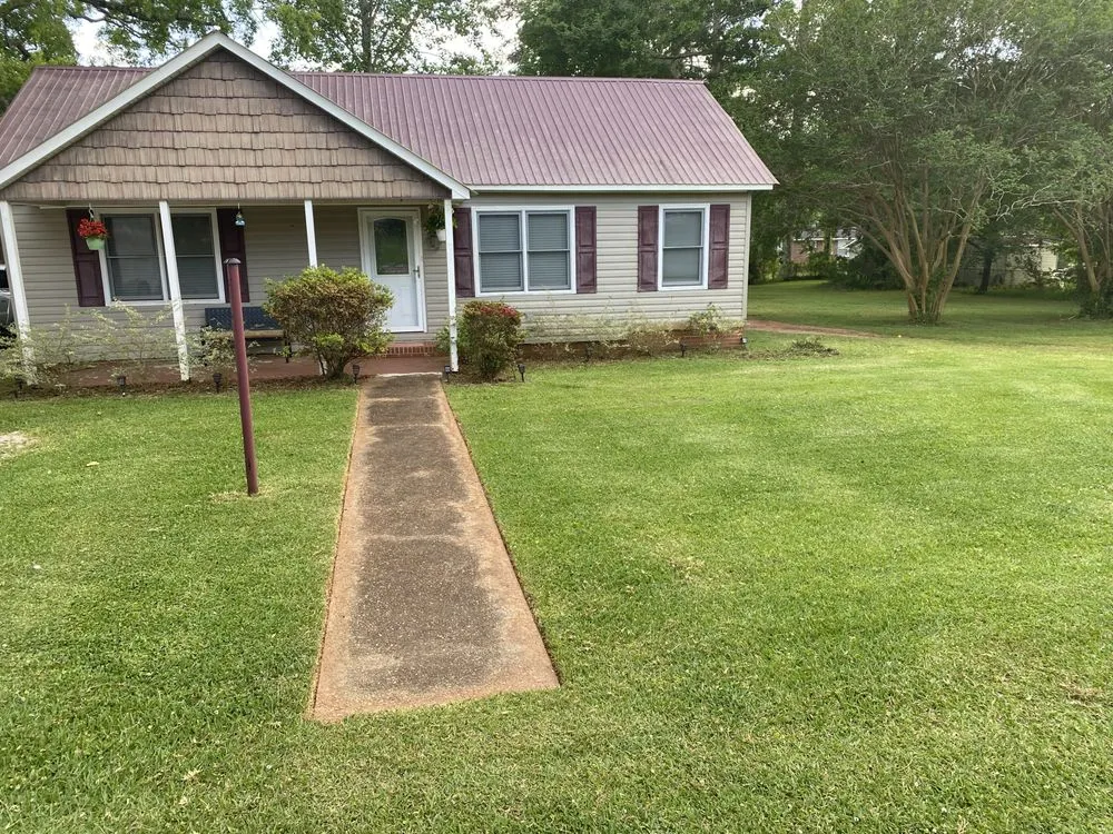 Reliable yard maintenance for residential properties across West Point, GA - J Crowe Properties