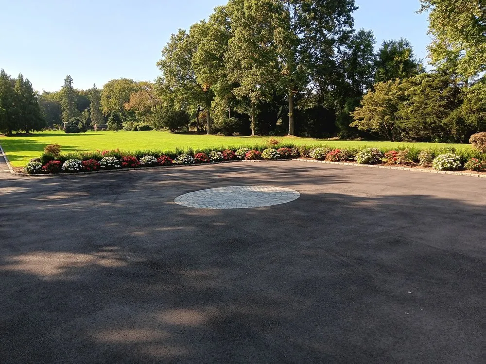 Local yard maintenance for year-round maintenance across Mineola, NY - J D Hernandez Landscaping Designing & Planting