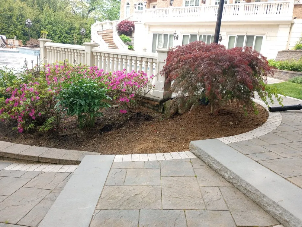 Affordable outdoor landscaping with custom design in Mineola, NY by J D Hernandez Landscaping Designing & Planting