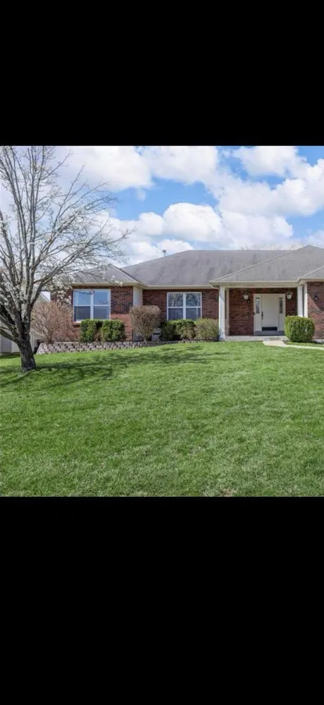 Professional landscape installation with custom design across St. Peters, MO - J Holt Lawn And Tree Removal