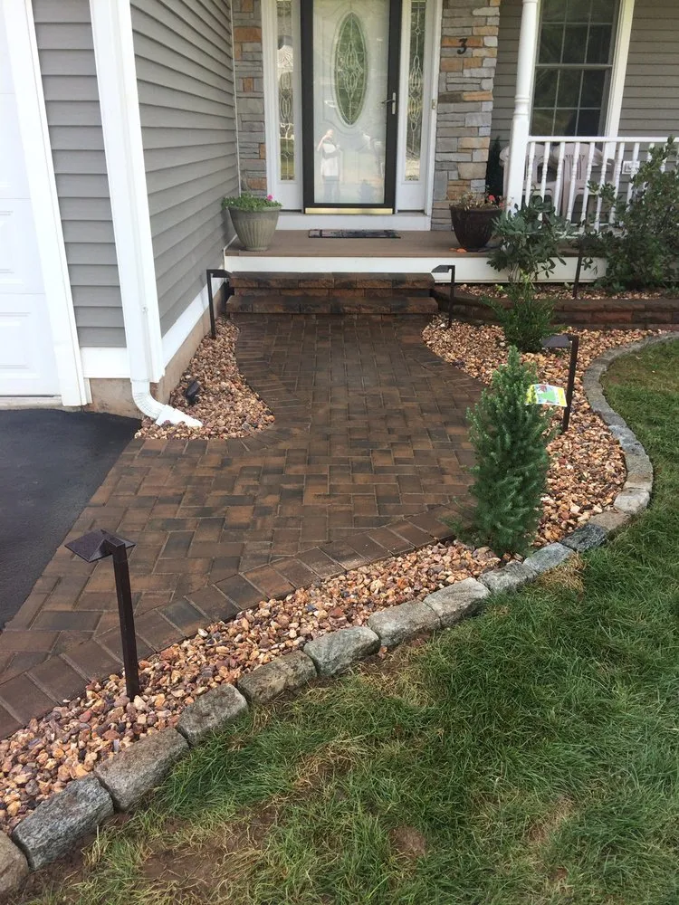 Custom lawn mowing service for year-round maintenance in Bristol, CT by J K Landscape Construction