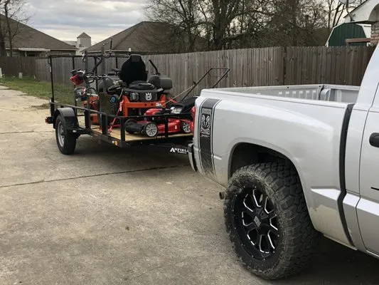 J M J LAWN CARE Logo