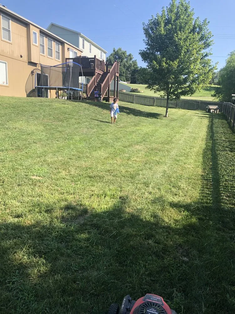 Professional landscape installation with custom design in Paola, KS by J3 Lawns