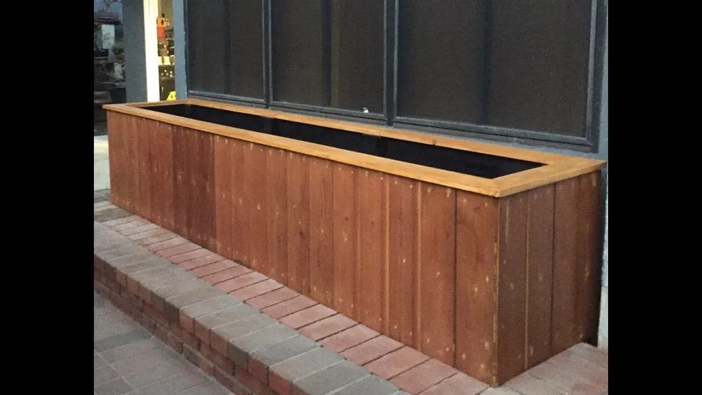 Custom yard cleanup service with custom design in South Gate, CA by Jaime's Landscape and Fences