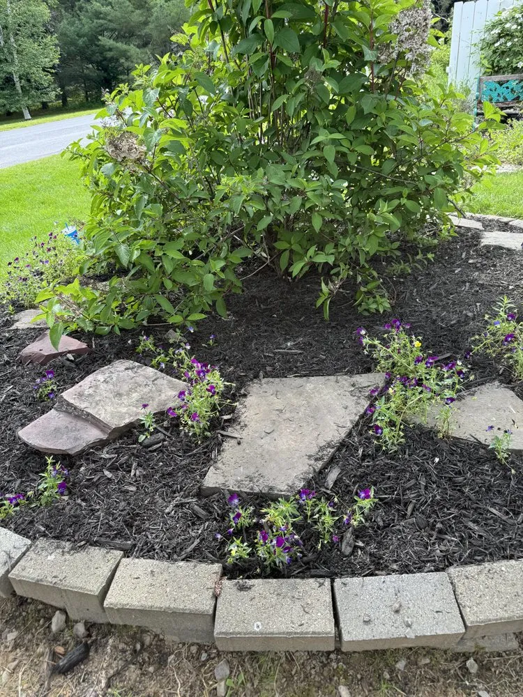 Custom yard cleanup service with custom design across Caribou, ME - Jake’s 4 Season Services