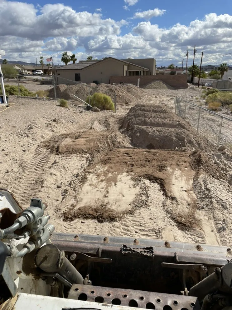 Expert yard maintenance for homes in Phoenix, AZ by Jakes Bobcat and hauling