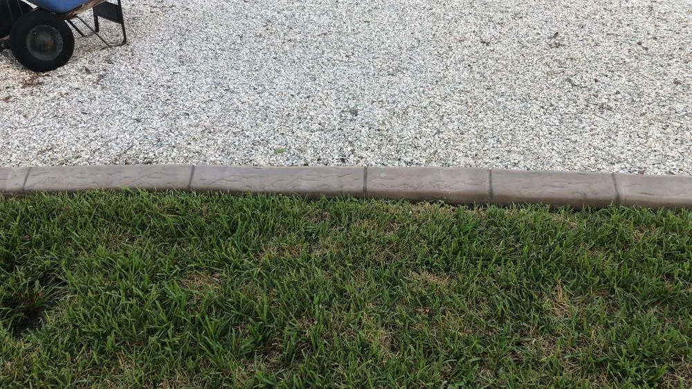 Professional landscape installation in Hudson, FL by JAM Curbing