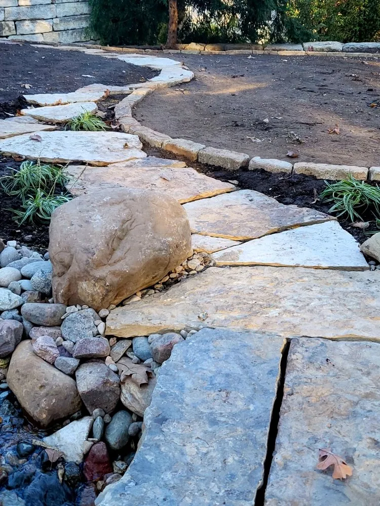 Expert lawn mowing service for homes in Independence, MO by Jam Landscape & Design