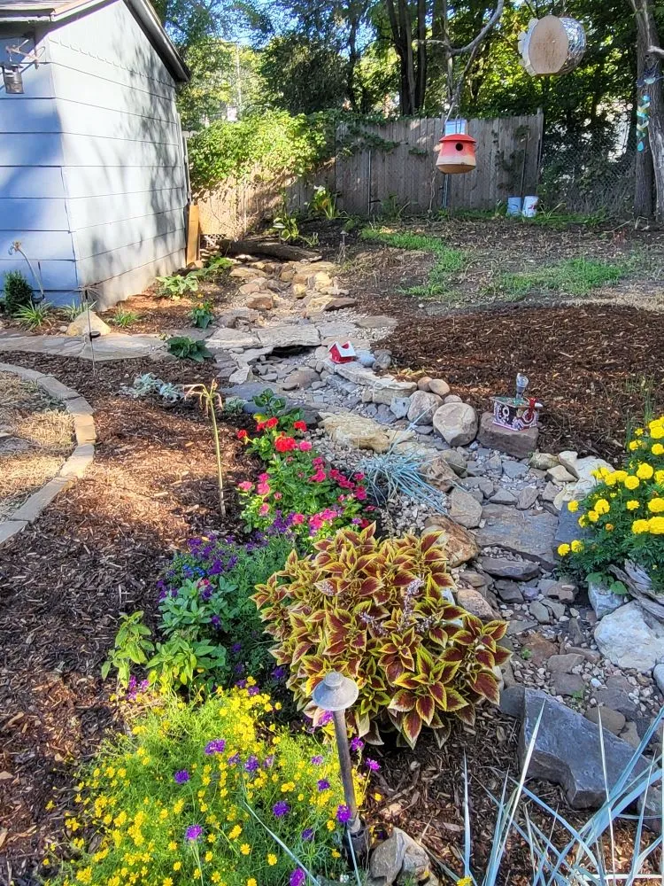 Affordable lawn care service for outdoor upgrades in Independence, MO by Jam Landscape & Design