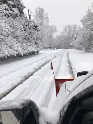 Jason Greenman Plowing and Lawn Mowing Logo