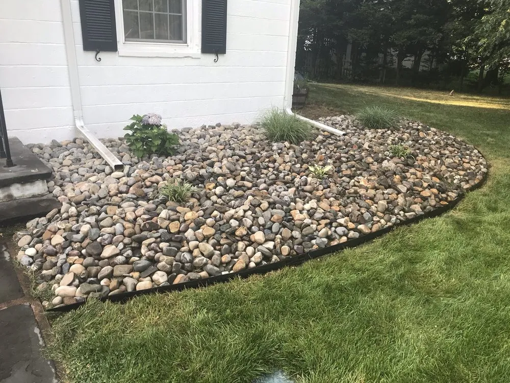 Affordable lawn mowing service with custom design in North Haven, CT by Jason Landscape Contractors