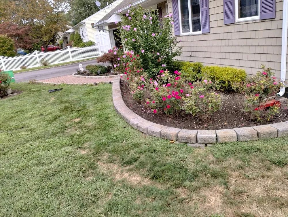 Affordable landscape design in East Patchogue, NY by Jason Landscaping