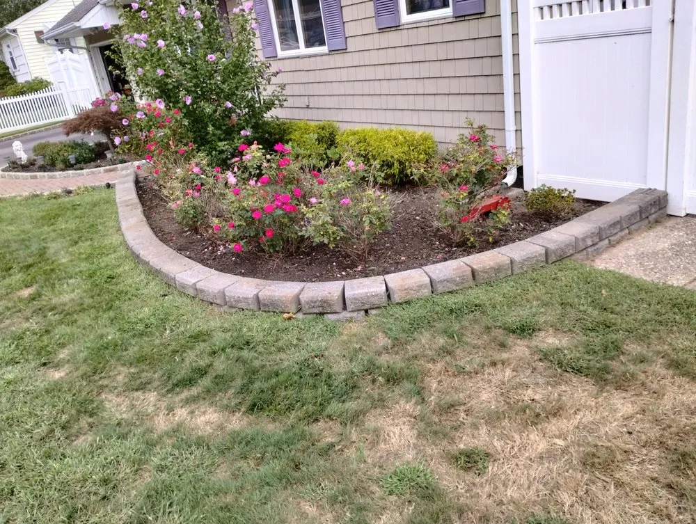Affordable landscape design in East Patchogue, NY by Jason Landscaping