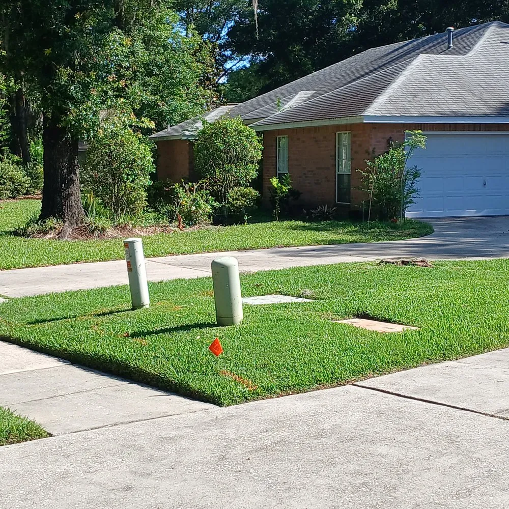 Custom landscape installation for residential properties in High Springs, FL by Jason's Ideal Lawn Care Service
