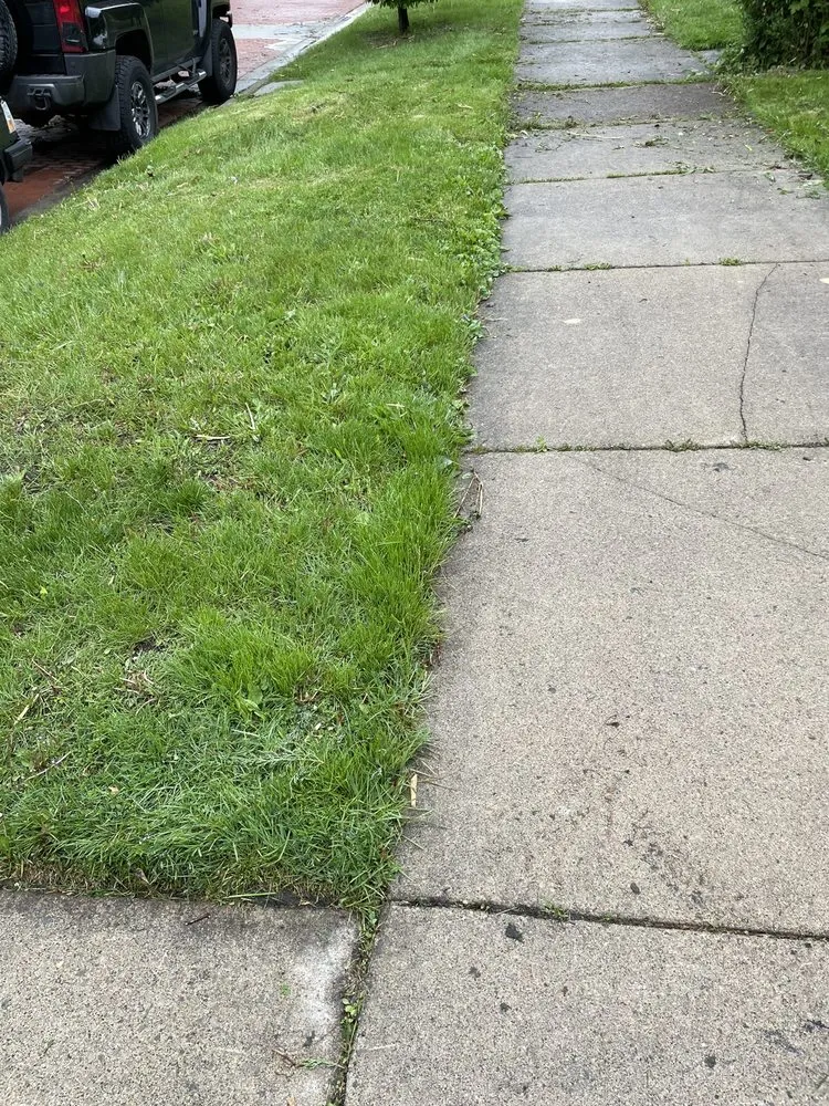 Local lawn mowing service in Detroit metro, MI by Jay's Lawn Care and Custom Curbs