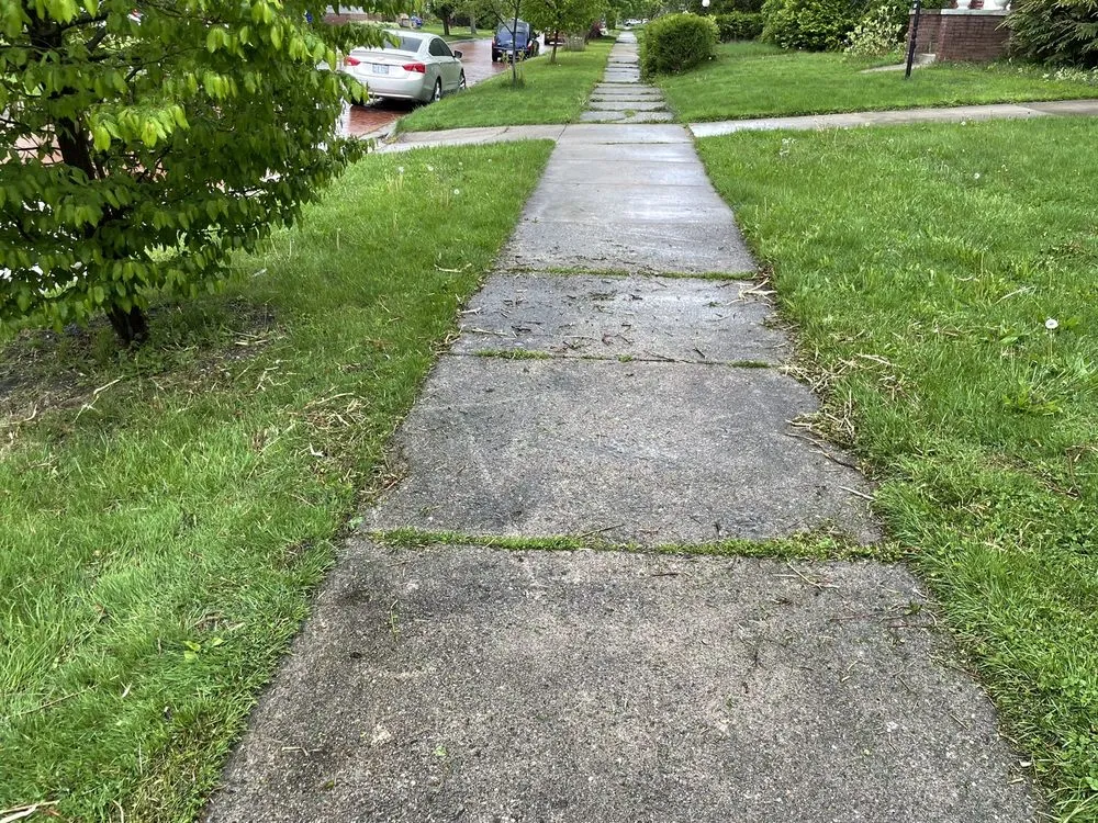 Affordable landscape design for beautiful yards in Detroit metro, MI by Jay's Lawn Care and Custom Curbs