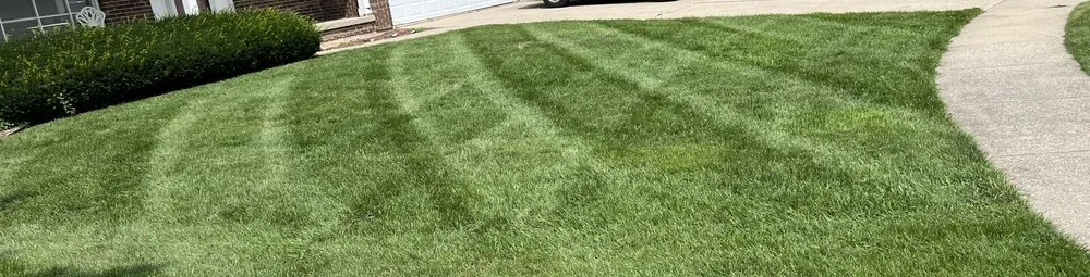 Local garden landscaping with custom design in Lansing, MI by Jays Lawn Care and Snow