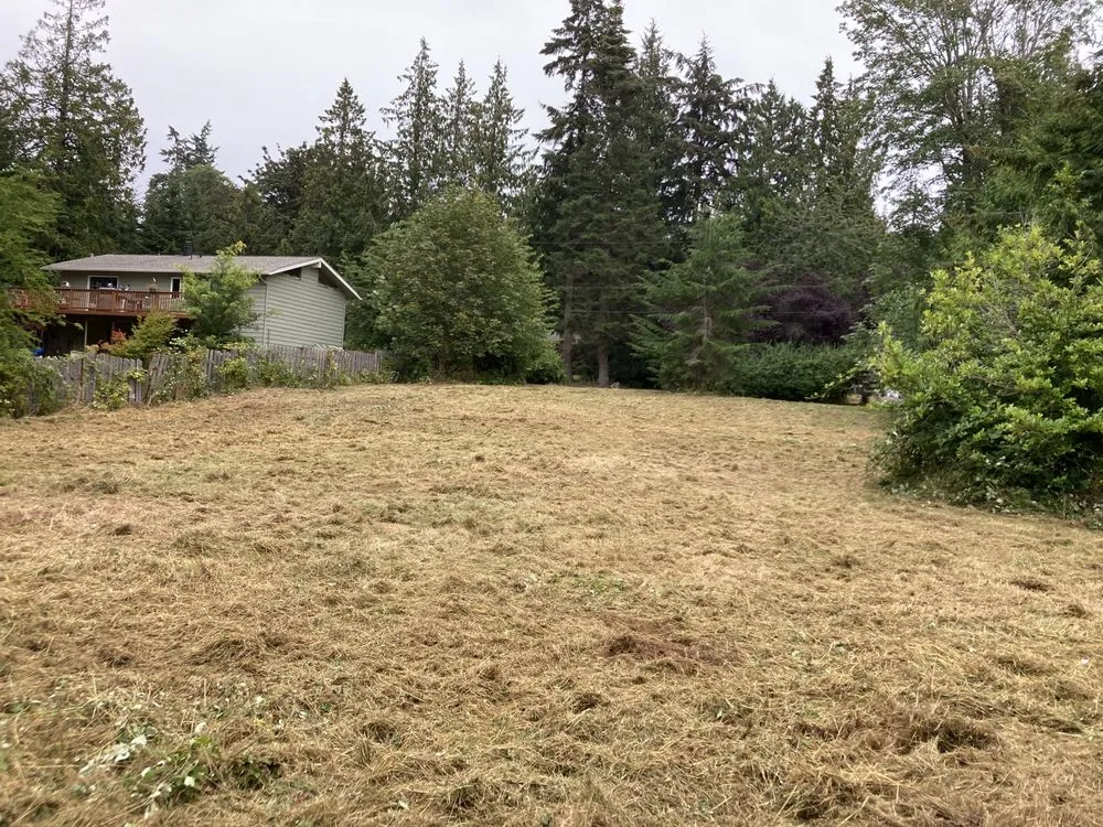 Professional lawn mowing service in Kingston, WA by Jay’s Tractor Works