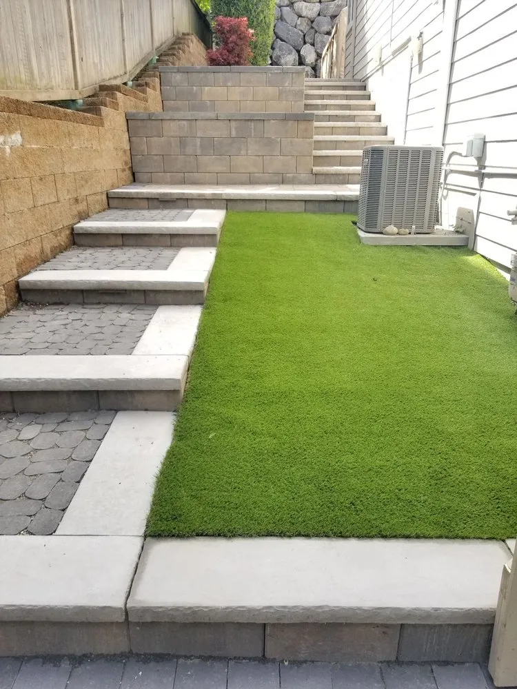 Expert lawn care service for outdoor upgrades in Bellevue, WA by JB Bricks Paver Landscaping