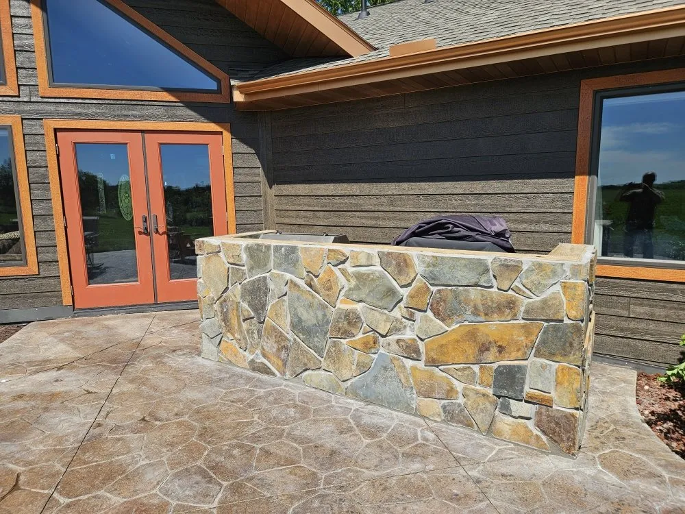 Professional residential landscaping for year-round maintenance across Cedar, MN - J&B Concrete