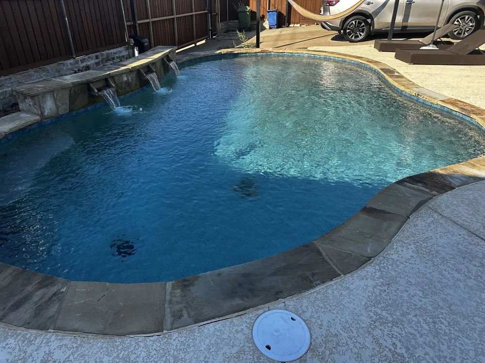 Custom yard cleanup service with custom design in Heath, TX by Jb Pools And Outdoor Management