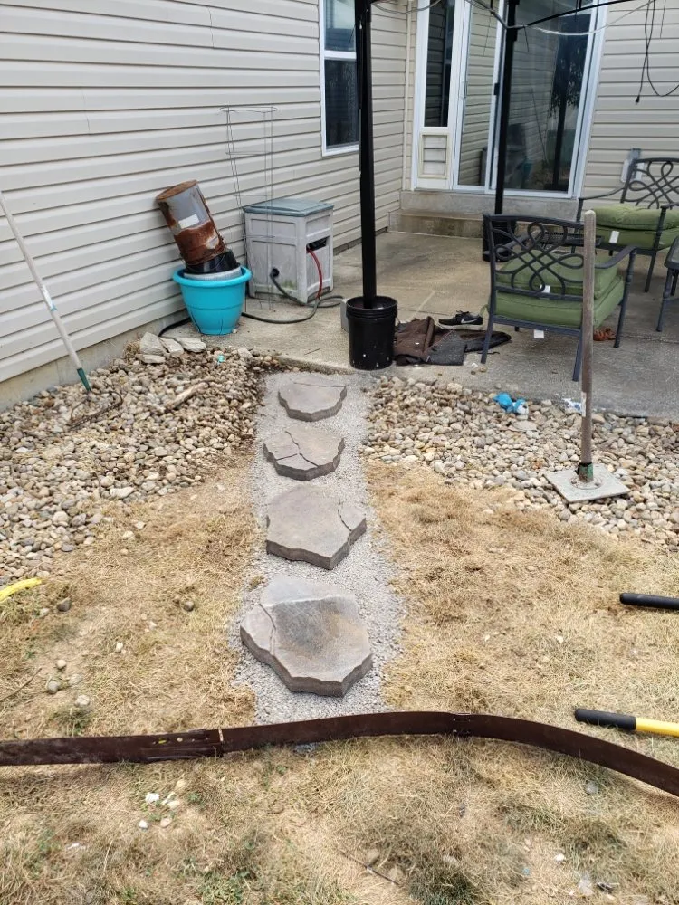 Affordable landscape design for residential properties in Ofallon, MO by Jb Quality Lawn Maintenance