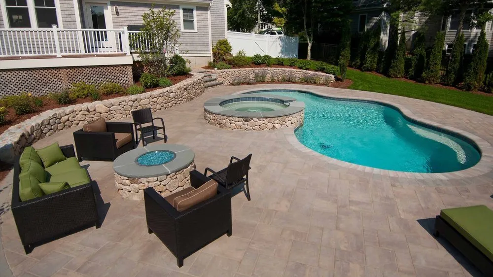 Trusted lawn mowing service for residential properties across Bridgewater, MA - J.B. Ramos Landscape Design & Excavation