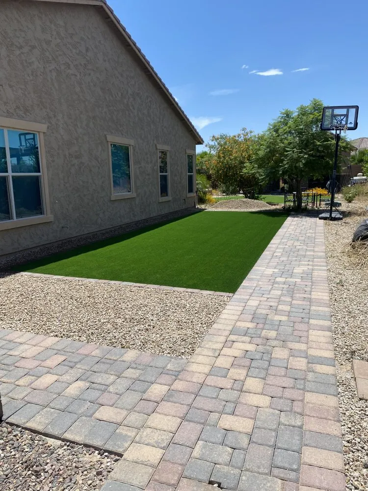 Professional lawn mowing service for year-round maintenance in Phoenix, AZ by JBHardscape
