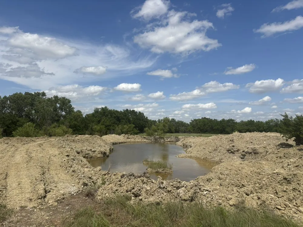 Trusted lawn care service for beautiful yards in Newton, KS by JBS Crew Co.