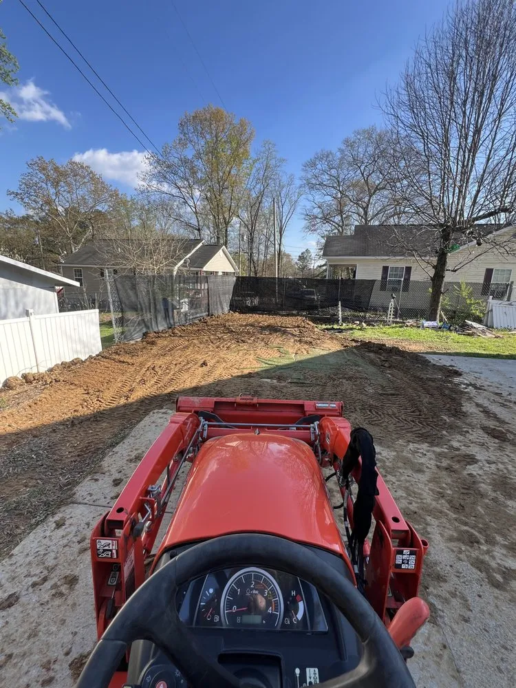 Professional lawn mowing service for year-round maintenance in Dalton, GA by JB’s Small Tractor Works and Stump Grinding