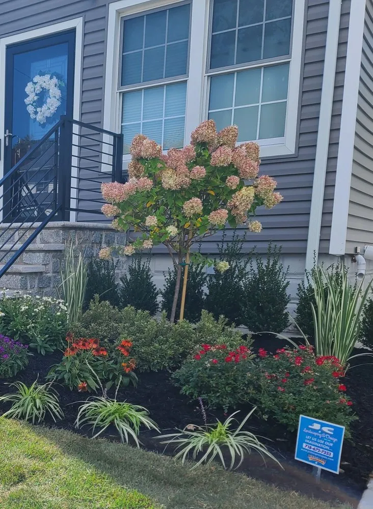 Reliable lawn mowing service for homes in Queens, NY by JC Landscaping & Design