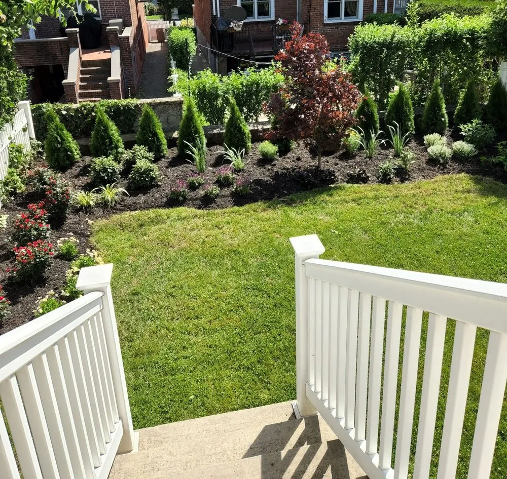 Custom lawn mowing service with custom design in Queens, NY by JC Landscaping & Design
