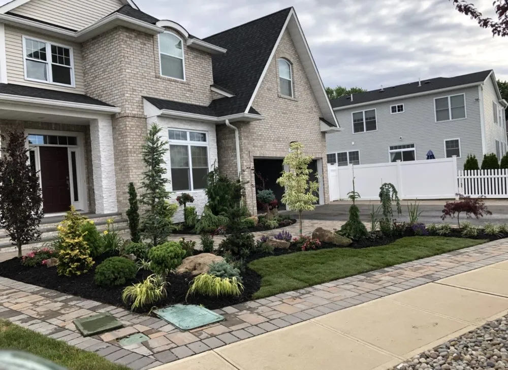 Local yard maintenance for year-round maintenance in Queens, NY by JC Landscaping & Design